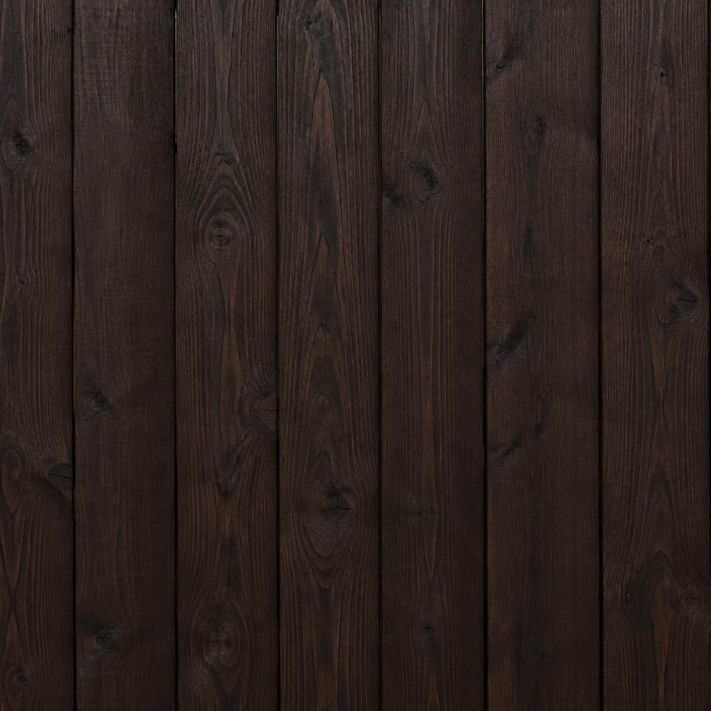 Cedar fence boards stained in Black Walnut