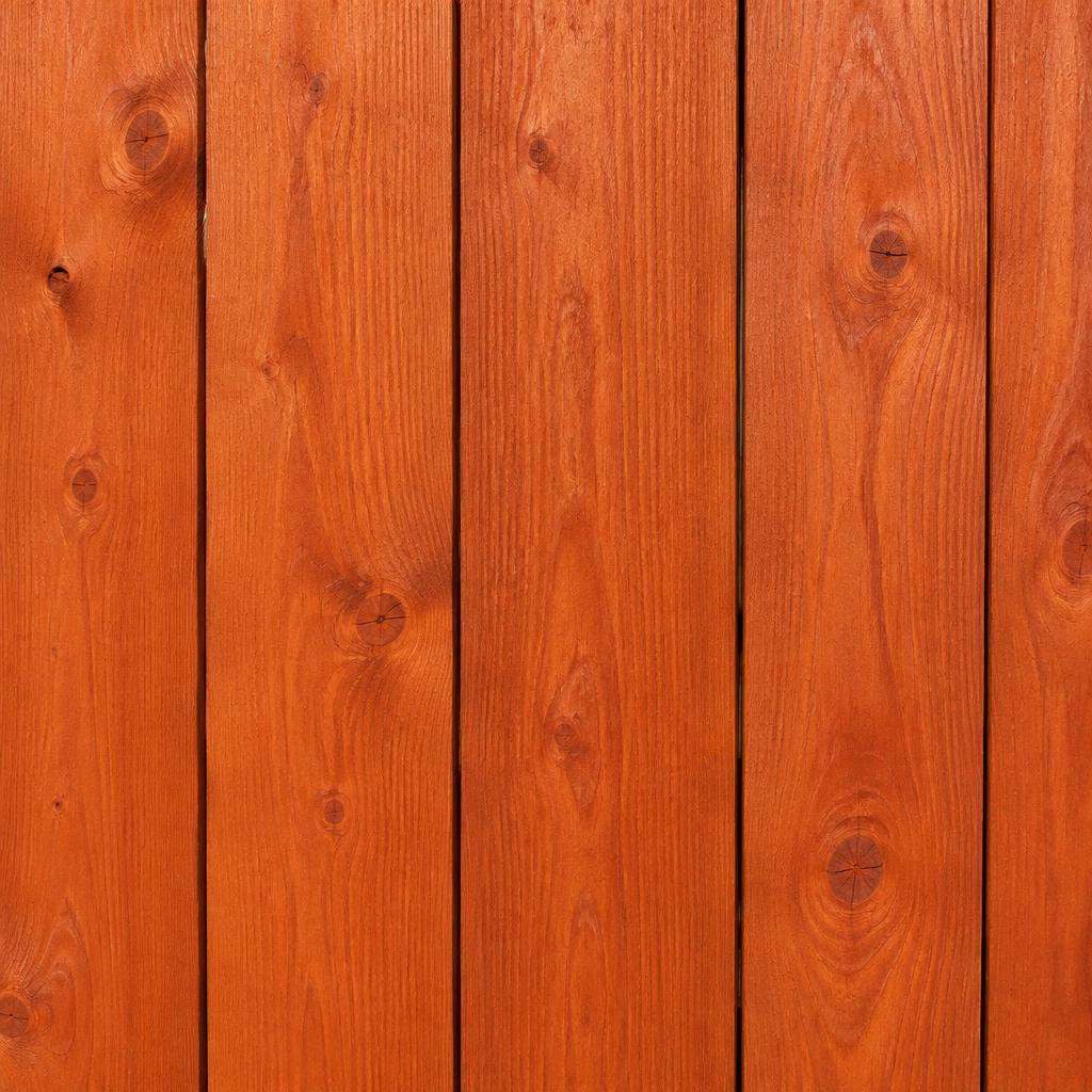 Cedar fence boards stained in Cedartone